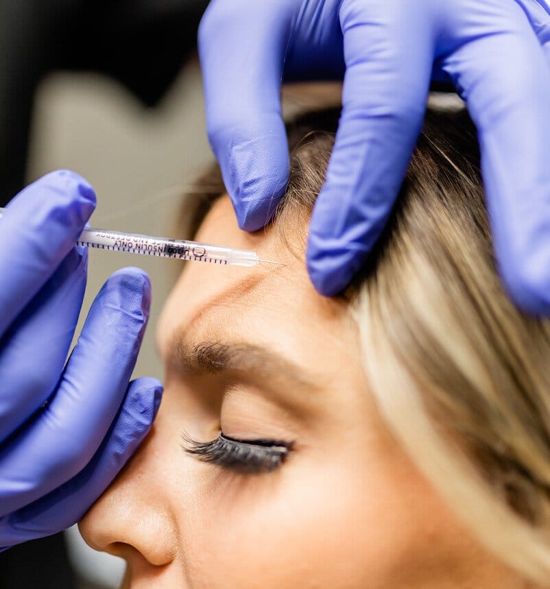 Woman receiving cosmetic injectables in Spring TX at Integrated Aesthetics